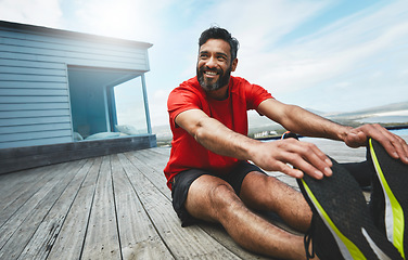 Image showing Man, stretching legs and fitness, start running or race with smile, muscle and ready for exercise outdoor. Athlete, sports and cardio in nature, health and wellness, workout for marathon and warm up