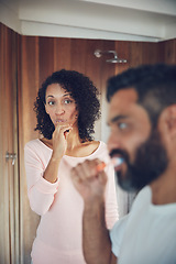 Image showing Bathroom, couple and brushing teeth together in routine, thinking and dental in morning, Man and woman, cleaning mouth and fresh by oral hygiene, self care and health or wellness in sanitary home