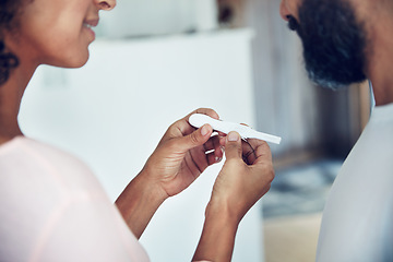 Image showing Couple, hands and waiting for pregnancy test, results and excited with smile, anxiety and check stick in home. Woman, man and medical inspection with hope, thinking and ideas for baby in bathroom