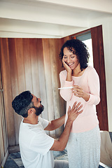 Image showing Couple, surprise and stomach with pregnancy test, positive and bed with smile, results and excited. Man, woman and baby with stick, love and maternity for future family, happy and pregnancy together