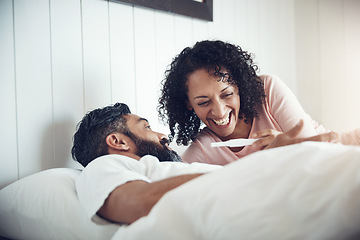 Image showing Couple, surprise and bedroom with pregnancy test, positive and bed with smile, results and excited. Man, woman and baby with stick, love and maternity for future family, parents and pregnant together