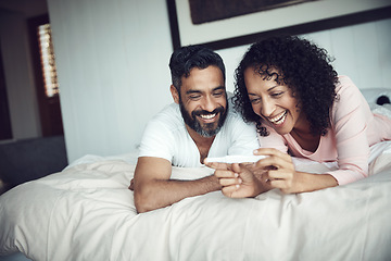 Image showing Couple, smiling and bedroom with pregnancy test, positive and bed with happiness, results and excited. Man, woman and baby with stick, love and maternity for future family, surprise and pregnancy