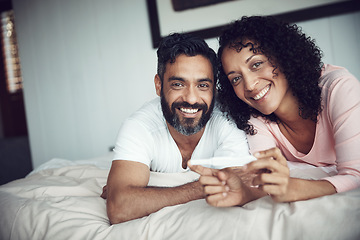 Image showing Couple, happy and portrait with pregnancy test, bedroom and positive with smiling, results and excited. Man, woman and baby with stick, love and maternity for future family, surprise and pregnant