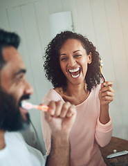 Image showing Cleaning, teeth and couple in bathroom with dental, healthcare and wellness in home. Happy, smile and people washing mouth with toothbrush, toothpaste and healthy brushing together in morning routine