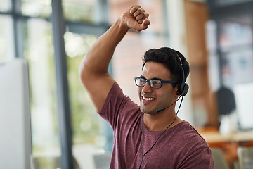 Image showing Man, call center winner and computer for success, winning and telecom achievement, target celebration or sales in office. Happy agent or consultant with yes, fist and excited for telemarketing goals