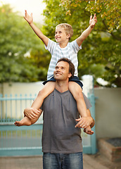 Image showing Piggy back, dad and son in backyard, cute bonding together with care and love outside home. Outdoor fun, support and father holding playful child with smile, trust and happy man with kid in driveway.