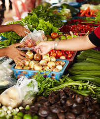 Image showing Vegetables, market and hands for shopping, trading goods and customer at local food store or outdoor vendor. Seller, supplier or small business people with healthy product, stock and sale for grocery