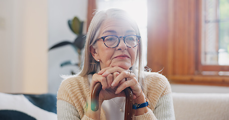 Image showing Home, thinking and senior woman with depression, sad and retirement with memory, remember and anxiety. Mature person, elderly lady and pensioner with walking stick, alzheimer and mental health