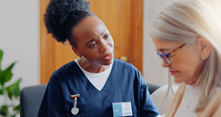 Image showing Frustrated, sad woman speaking or nurse with results in consultation for bad news or cancer. Stress, lady talking or caregiver with a depressed mature patient for empathy, sympathy or help in home