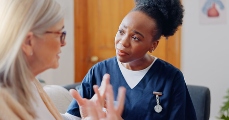 Image showing Frustrated, sad woman speaking or nurse with results in consultation for bad news or cancer. Stress, lady talking or caregiver with a depressed mature patient for empathy, sympathy or help in home