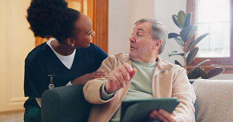 Image showing Tablet, nurse and senior man on sofa browsing on internet for medical consultation research. Bonding, healthcare and black woman caregiver talking to elderly patient networking on technology at home.