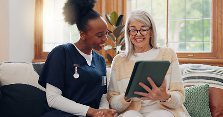 Image showing Senior, woman and caregiver with tablet for consulting, medical information and health communication on sofa. Elderly, professional and nurse with touchscreen for online report, advisory and results