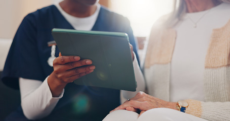 Image showing Senior, woman and nurse with tablet for consulting, medical information and health communication on sofa. Elderly, professional and caregiver with touchscreen for online report, advisory and results