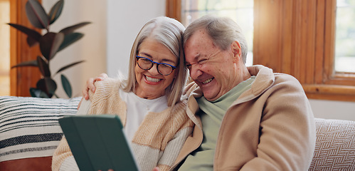 Image showing Tablet, laugh and senior couple on a sofa watching a funny, comic or comedy video on social media. Happy, smile and elderly people in retirement scroll on mobile app or internet on digital technology