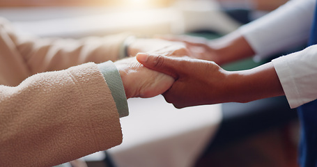 Image showing Nurse holding hands with a senior patient for empathy, trust or support of help, advice or healthcare. Consulting, elderly person or medical therapy with doctor for hope, consultation or depression