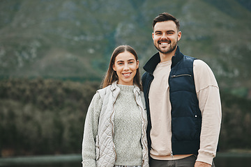Image showing Hiking, couple and portrait outdoor with vacation and trekking together with love in winter. Mountain, holiday and travel in the morning with happy woman and man on adventure in nature with a smile