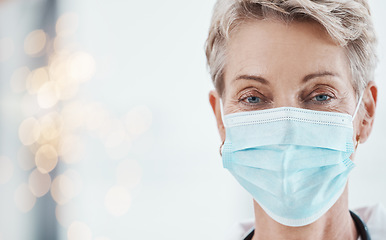 Image showing Face mask, covid compliance and woman doctor in a hospital for health, safety and wellness with healthcare insurance. Portrait of female medical worker during covid19 pandemic in clean hospital