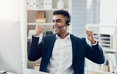 Image showing Businessman, call center and winner sale in telemarketing, broker or customer service at office. Excited employee consultant man celebrating win, deal or bonus in proud achievement at the workplace