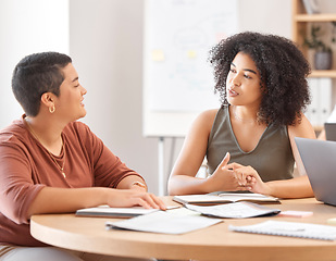 Image showing Business women, paper and talking in teamwork collaboration, digital marketing strategy planning and office finance budget. Creative designers, worker and employee documents in brand growth research