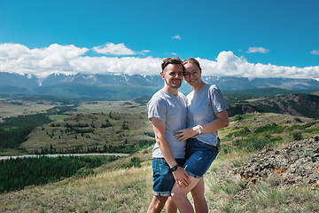 Image showing Loving couple together on mountain