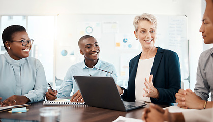 Image showing Diversity, laptop and team brainstorming, conversation and planning for group project with leader, smile and in office together. Teamwork, talking or discussion for marketing strategy or sales growth