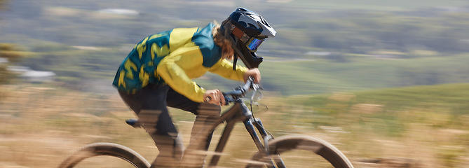 Image showing Bike, fitness and man cycling with speed on a sports bicycle for cardio exercise, workout and training for a race. Action, biker and healthy athlete riding fast in nature outdoors in summer in Texas