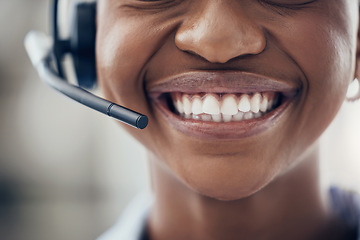 Image showing Black woman, teeth and smile with headset in call center, customer service or contact us at the office. Closeup of happy African American female consultant with toothy mouth smiling for telemarketing