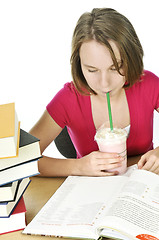 Image showing Teenage girl with milkshake