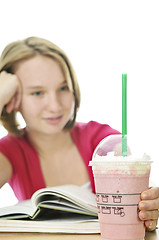 Image showing Teenage girl with milkshake