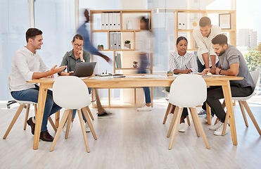 Image showing Busy office, team and coworking employee group planning a digital strategy at a desk. Teamwork, collaboration and online marketing workforce with technology speaking about a advertising web schedule