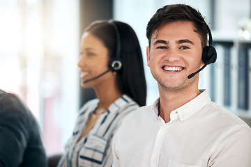 Image showing Man, consultant and call center with smile for customer service, telemarketing or advice at the office. Happy male employee smiling with headset in contact us, consulting or desktop support agency