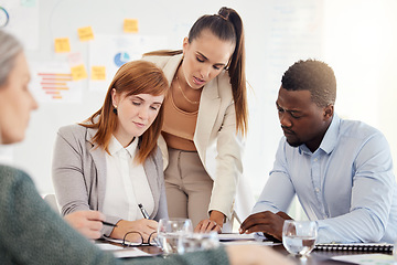 Image showing Business people, financial and meeting in office with serious corporate workers planning, writing and preparing for audit. Finance, documents and busy group of employee rushing to meet a deadline