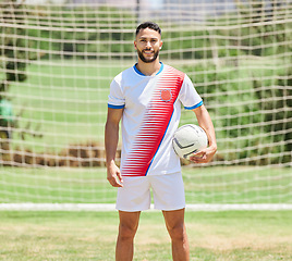 Image showing Fitness, sports and soccer player portrait on a football field ready to play a soccer match or training game. Healthy, smile and happy athlete on a grass pitch for a cardio exercise and workout