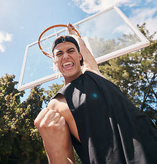 Image showing Basketball, man and winner in score for sports game, celebration or match in the court outdoors. Excited, energetic male basketball player celebrating victory dunk or sport success for point outside