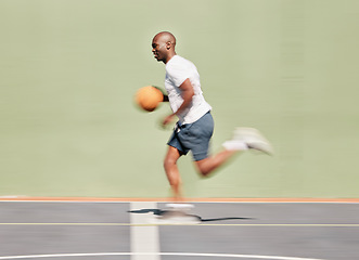 Image showing Fitness, sports and black man running on basketball court in training workout or cardio exercise with speed, Blurry, athlete and fast African basketball player playing a game with energy and agility