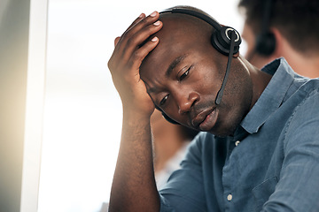 Image showing Call center, stress and black man sad about telemarketing depression, problem or work in a crm office. Ecommerce, consulting and African customer service worker thinking of a problem online in sales