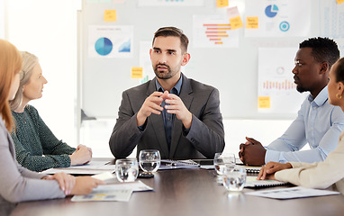 Image showing Business meeting, finance strategy and corporate man speaker with an office team talking and planning. Teamwork, working and company communication of a discussion about financial data and information