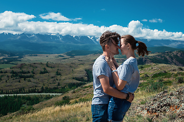 Image showing Loving couple together on mountain