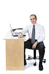 Image showing Businessman at his desk on white background