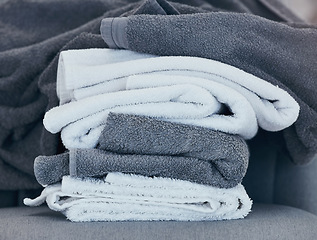 Image showing Towels, clean and laundry with texture and fabric for cleaning and hygiene in hospitality or home. Fresh washing, cleaning service or household maintenance closeup with cotton towel and textures.