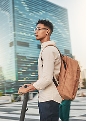 Image showing Hipster businessman, electrical scooter and city travel, transportation and urban movement for sustainability, carbon footprint and eco friendly lifestyle. Gen z guy on mobile electric scooter ebike