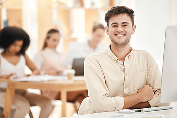 Image showing Smile, portrait and businessman working on a computer for marketing, communication and corporate at work. Happy, startup and young worker in connection on technology in a coworking office with mockup