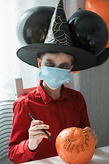 Image showing Halloween carnival with new reality with pandemic concept.