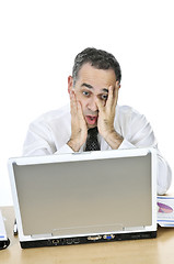 Image showing Businessman at his desk on white background