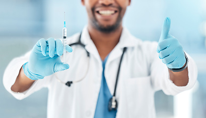 Image showing Doctor, vaccine syringe and thumbs up at work in hospital, clinic or office in healthcare. Medic, man and professional in medical worker show hand sign working in health, medicine or community safety