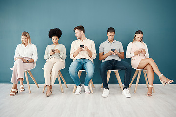 Image showing Business people, waiting room and smartphone for job search engine, internet networking and reading email feedback from Human Resources. Diversity group using phone for career, recruitment and hiring