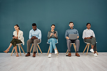 Image showing Recruitment, phone and laptop chair row of people at workspace corridor waiting with mockup. Company interview queue process with online connection for application, notes or social media.