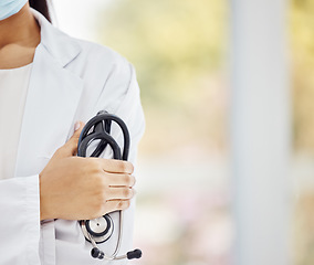 Image showing Healthcare, Covid and doctor, woman with stethoscope in hand and boss at hospital or clinic cropped. Help, success and support, confident female medical professional or health care employee at work.