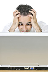 Image showing Businessman at his desk on white background