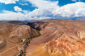 Image showing Yellow nad red mountains resembling the surface of Mars